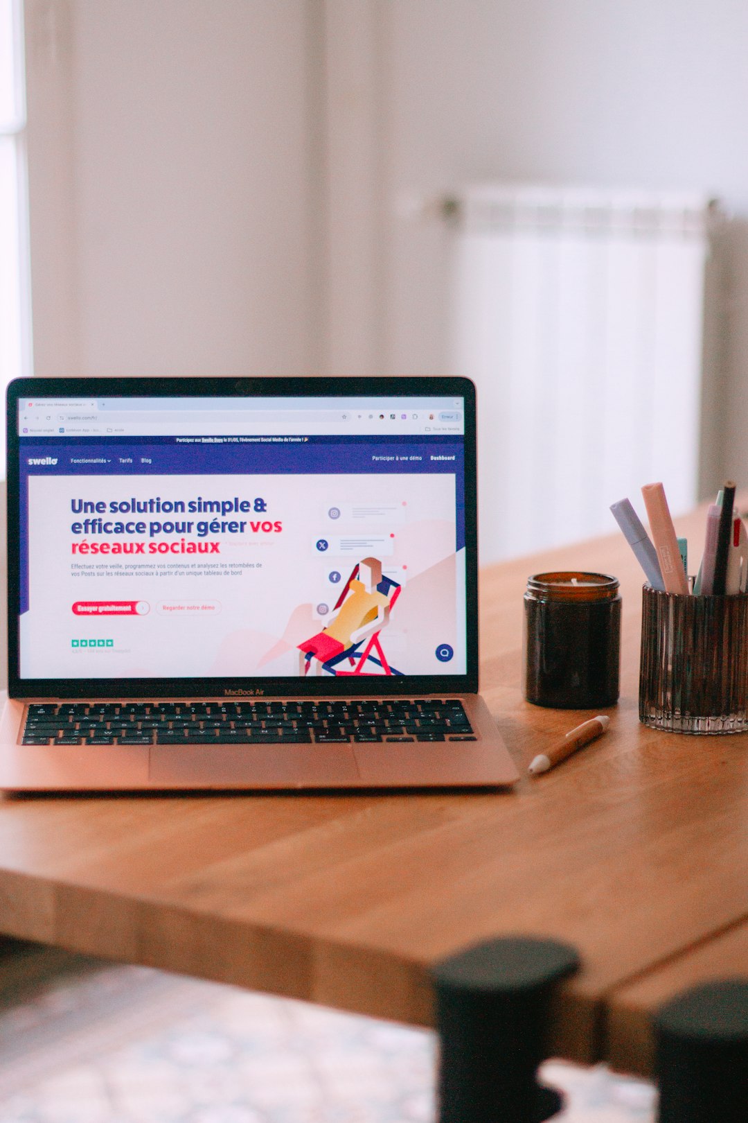 a-laptop-computer-sitting-on-top-of-a-wooden-table-cnm2icfijfs